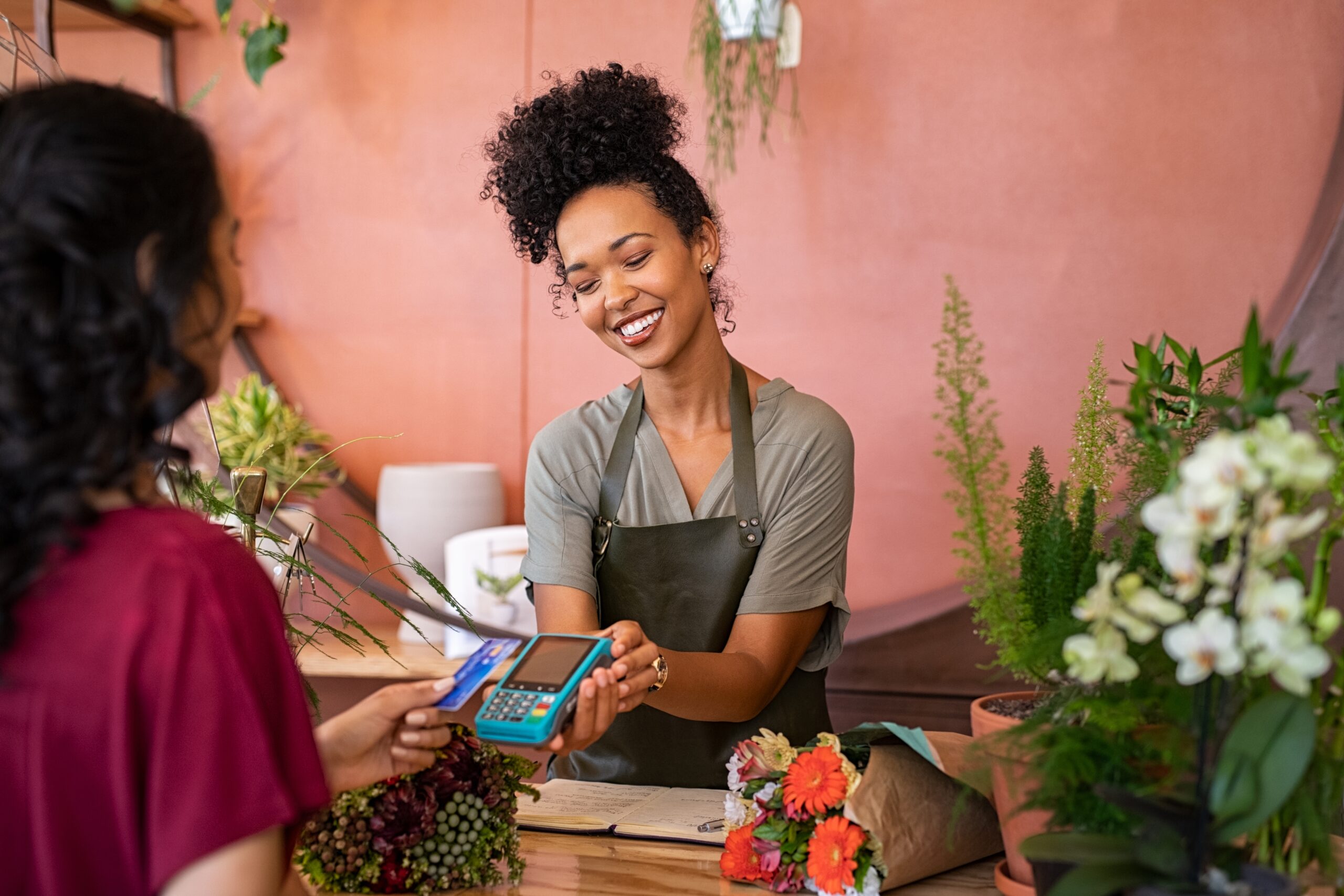 Woman buying flowers